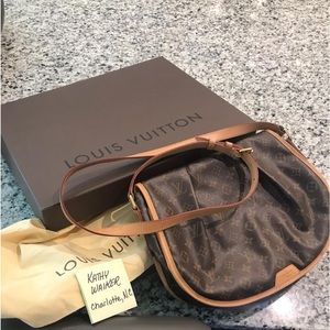 Guaranteed Authentic Louis Vuitton Menilmontant MM crossbody bag